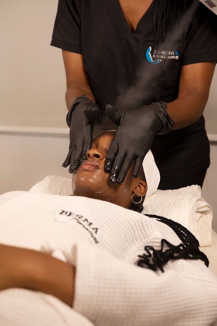 why-choose-us A professional facial spa treatment in Nigeria, featuring skincare expertise in a relaxing environment.